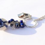 Lange Delfts blauwe ketting met klompje en molen