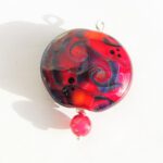 Handgemaakte lampwork glashanger roze met zilverglas