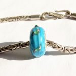 Handgemaakte Pandora stijl glaskraal beige turquoise stippen