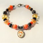 Hello Kitty kinderarmband tijger, oranje zwart met vlinders