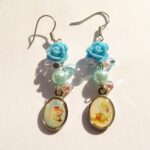 Blauwe oorbellen met engeltjes