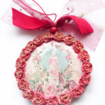 kersthanger met kaars en roodborstje