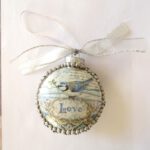 Handgemaakte kerstbal met pimpelmees